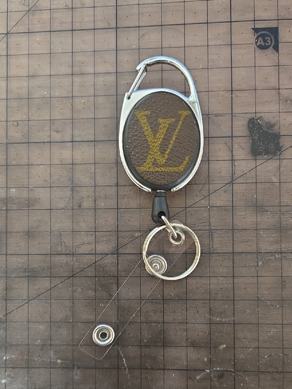 Brown and Yellow Monogram Retractable Key Reel